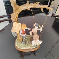 Statua Capodimonte Bambini sull'altalena