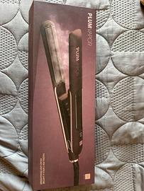 Piastra per capelli a vapore