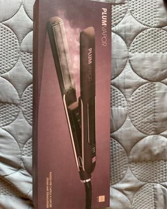 Piastra per capelli a vapore