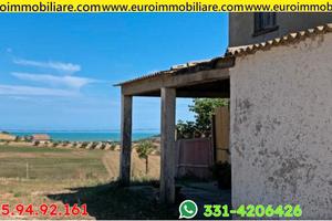 Fabbricato da ristrutturare vista mare con terreno