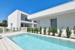 Due camere con giardino in residence con piscina