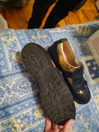 scarpe da donna dorate e nere wleganti