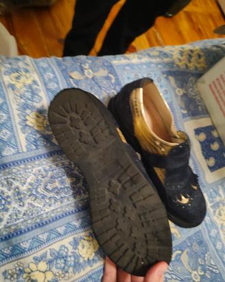 scarpe da donna dorate e nere wleganti