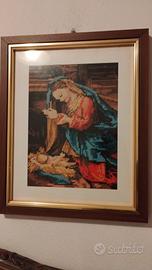 Quadro ricamato a mezzo punto.