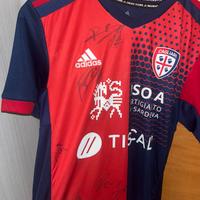 Maglia Cagliari Nuova con etichetta con 7 firme