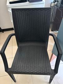 Sedie in rattan con braccioli