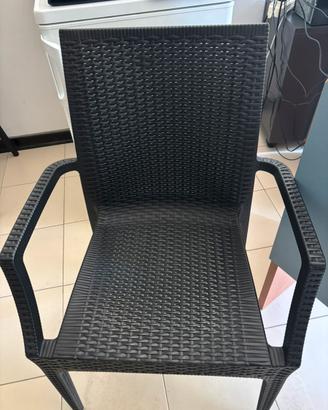 Sedie in rattan con braccioli