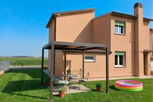 Appartamento in bifamiliare con giardino privato