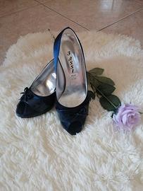 Scarpe con tacco "Lavorazione artigiana".