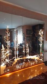 Specchio a pannelli illuminanti