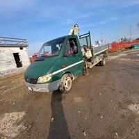 Mercedes ribaltabile su tre lati con gru