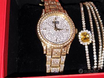 Orologio + bracciali stroili 80 euro