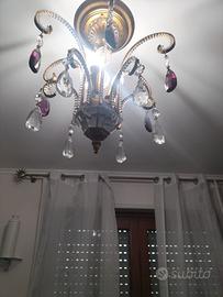 Lampadario  bagnato in oro con cristalli