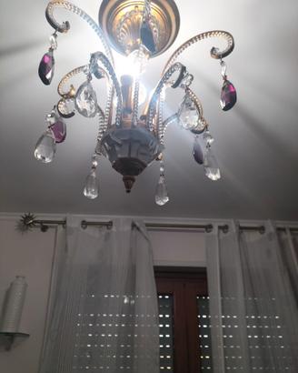 Lampadario  bagnato in oro con cristalli