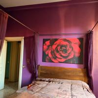 Letto baldacchino in legno con pedana