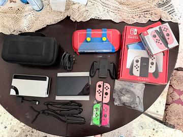 Nintendo switch OLED + gioco mario kart delux