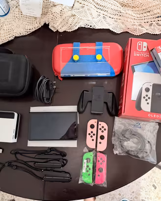 Nintendo switch OLED + gioco mario kart delux