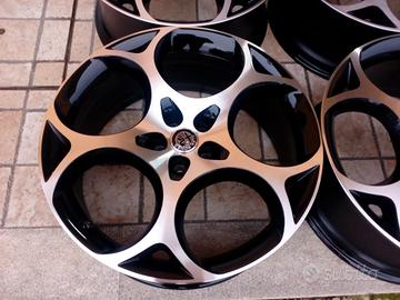 CERCHI 21 ORIGINALI ALFA ROMEO COD:2040