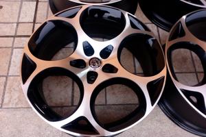 CERCHI 21 ORIGINALI ALFA ROMEO COD:2040