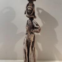 Statua ceramica sarda Stelio Mola donna con bricca