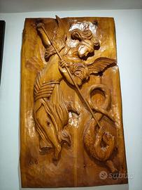 Bassorilievo in legno scolpito a mano 
