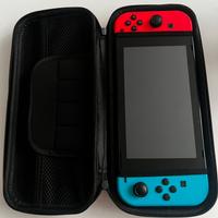 Nintendo Switch + 2 giochi e accessori vari.