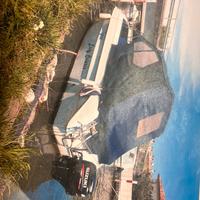 Barca semicabinato  a motore Suzuki 40