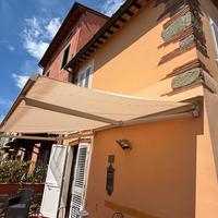 Tenda da sole a bracci estensibili