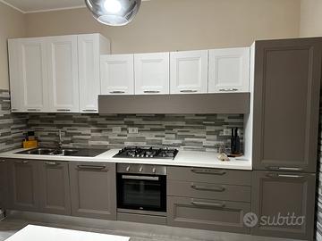 Arredamento cucina, salone e camera da letto