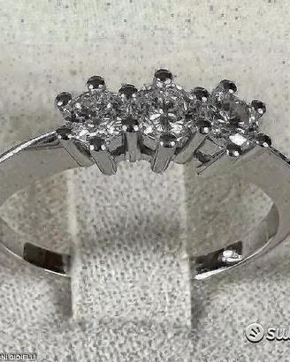 ANELLO TRILOGY ORO 18kt. E DIAMANTI NATURALI 0,52