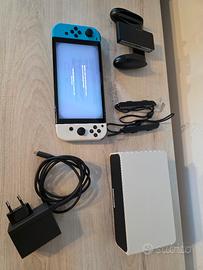 Nintendo Switch Oled + giochi e accessori