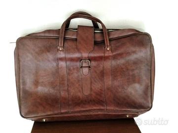 Valigia vintage in pelle marrone