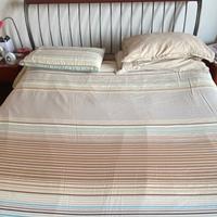 Letto in ferro battuto e ciliegio