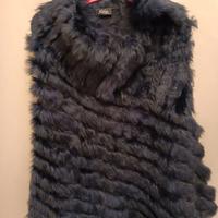 Poncho in maglia e pelliccia