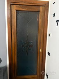 Porta scorrevole e 3 porte battente