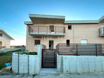 Villa bifamiliare nuova costruzione con giardino