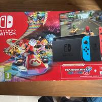 Nintendo switch bundle con 3 giochi e card memoria