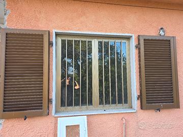 infissi in alluminio con inferriate 