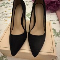 Scarpe a punta con tacco largo