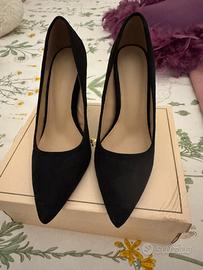 Scarpe a punta con tacco largo