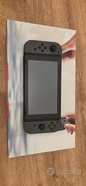 Nintendo Switch + 2 giochi + accessori