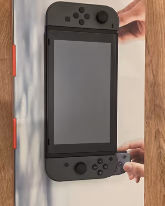 Nintendo Switch + 2 giochi + accessori