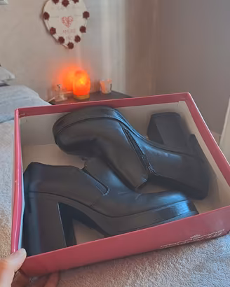 Tronchetti con plateau/stivaletti in pelle