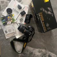 Nikon D3100 + 18-55 VR Kit