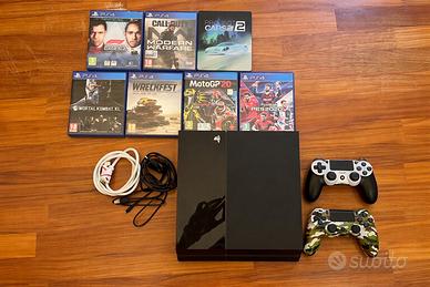 Play Station 4 - 410GB + 2 controller + 8 giochi