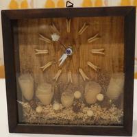 Orologio con decorazioni a découpage