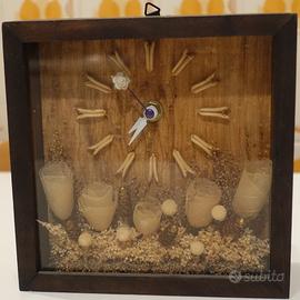 Orologio con decorazioni a découpage