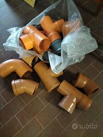 raccordi tubi PVC arancioni