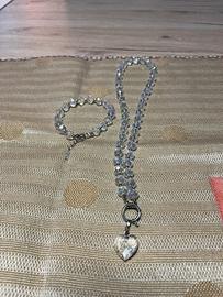 Collana e braccialetto con cristalli e ciondolo