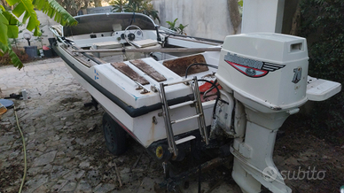 Barca open con motore 70cc +carrello